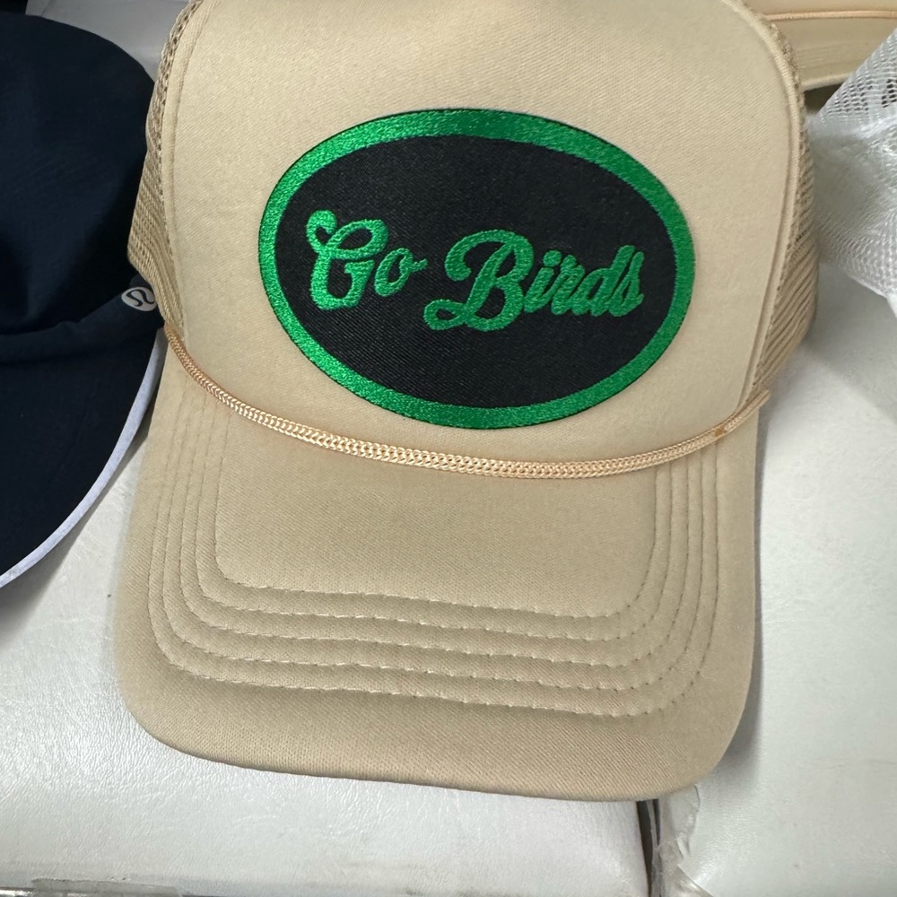 Tan Trucker Eagles Hat with Green Logo